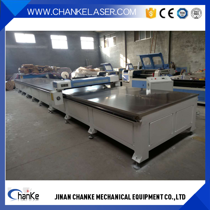 1.6mx12m Size Automatic CO2 Cloth Leather Fabric Laser Cutting Machine with Good Price